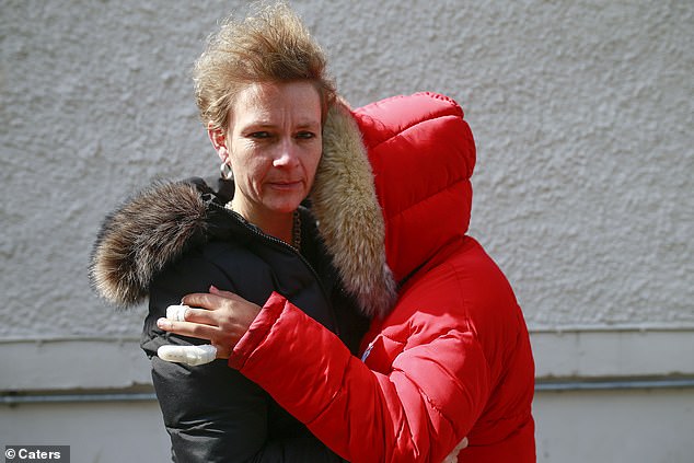 Her mother Lindsay Dunn, pictured with her daughter whose identity is not being revealed, said the teenager was racially abused before the attack by 